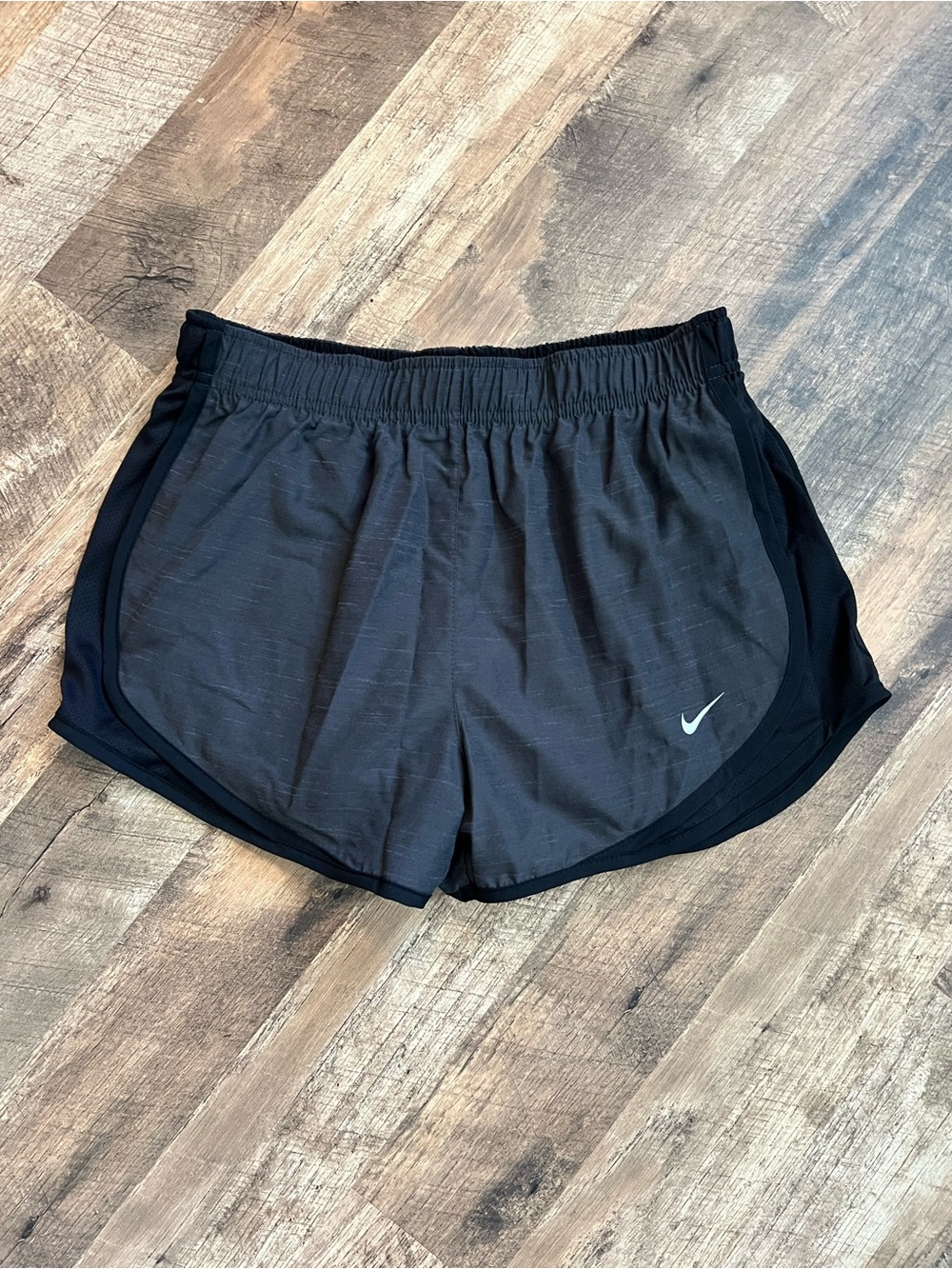 Nike Women's Charcoal Grey and Black Athletic Running Shorts with Silver Swoosh